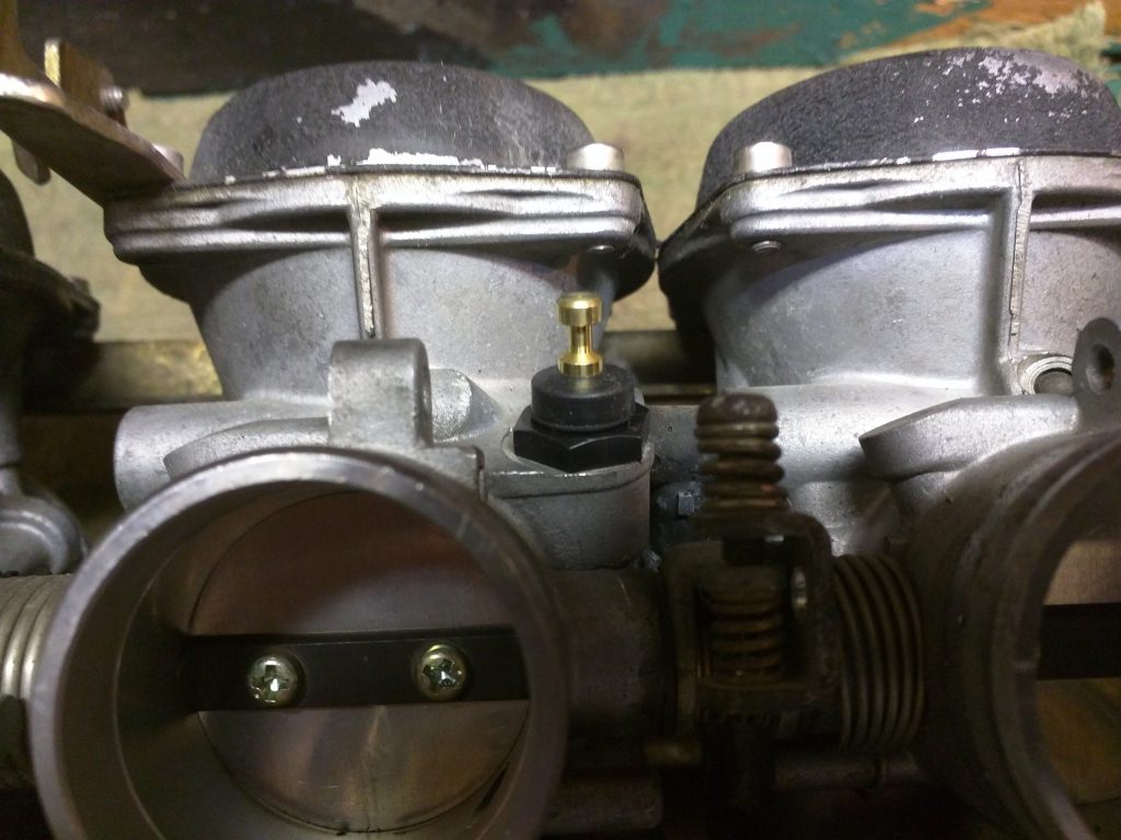 New choke valve and nut installed